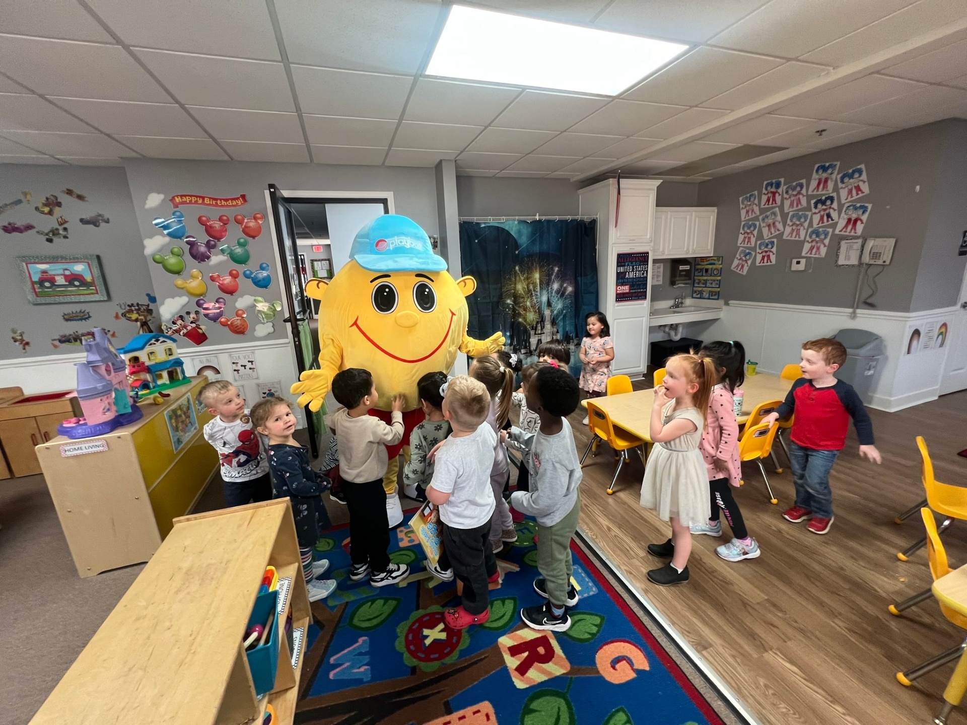 Mascot greeting kids in the classroom